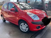 Gebraucht Nissan Pixo 68 PS (50 kW) 2010 Rot Kleinwagen