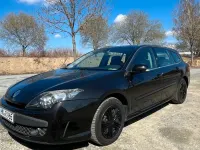 Używany Renault Laguna III 110 KM (80 kW) 2010 Czarny Sedan/Limuzyna