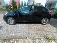 Gebraucht Kia Rio 109 PS (80 kW) 2012 Schwarz Kleinwagen