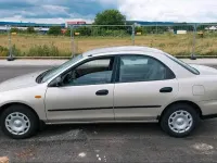 Gebraucht Mazda 323 Comfort 88 PS (64 kW) 1996 Beige Limousine