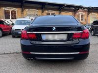 Second-hand BMW 730 211 CP (155 kW) 2014 Negru Berlinǎ