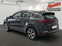 Gebraucht Kia Sportage Vision 177 PS (130 kW) 2020 H8g) pentametal met. (grau SUV