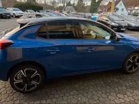 Gebraucht Opel Corsa 101 PS (74 kW) 2024 Lackierung voltaic blue met/ty Kleinwagen