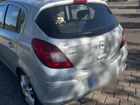 Second-hand Opel Corsa 90 CP (66 kW) 2009 Argintiu Hatchback