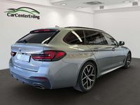 Gebraucht BMW 520 M Sport 190 PS (139 kW) 2023 Skyscraper grau metallic Kombi
