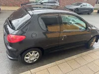 Gebraucht Peugeot 206 60 PS (44 kW) 2009 Schwarz Limousine