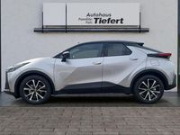 Gebraucht Toyota C-HR Team 140 PS (102 kW) 2023 Shimmering silver metallic / dach schwarz SUV