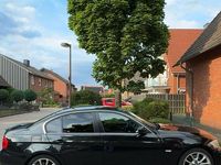 Gebraucht BMW 320 181 PS (133 kW) 2010 Schwarz Limousine