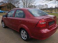 Gebraucht Chevrolet Aveo 75 PS (55 kW) 2009 Rot Limousine