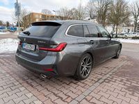 Gebraucht BMW 330e 184 PS (135 kW) 2021 Mineralgrau Kombi