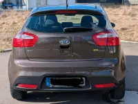 Używany Kia Rio 109 KM (80 kW) 2012 Brązowy Hatchback