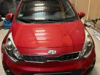 Gebraucht Kia Rio 90 PS (66 kW) 2012 Rot Limousine