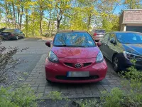 Gebraucht Toyota Aygo 68 PS (50 kW) 2006 Rot Kleinwagen