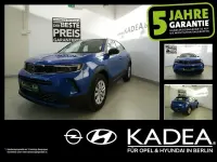 Gebraucht Opel Mokka 101 PS (74 kW) 2023 Perl blau/voltaik blau (metallic) SUV