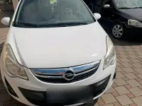 Second-hand Opel Corsa 84 CP (61 kW) 2012 Alb Hatchback
