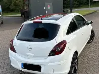 Używany Opel Corsa Edition 65 KM (47 kW) 2009 Biały Hatchback