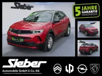 Używany Opel Mokka Edition 101 KM (74 kW) 2023 Czerwony SUV
