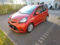 Gebraucht Toyota Aygo 68 PS (50 kW) 2012 Orange Kleinwagen