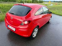 Gebraucht Opel Corsa Satellite 69 PS (50 kW) 2011 Magma rot (b) Kleinwagen