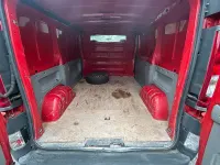 Gebraucht Renault Trafic 90 PS (66 kW) 2010 Rot Van / Kleinbus