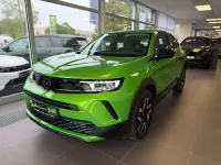 Gebraucht Opel Mokka Elegance 101 PS (74 kW) 2024 Lackierung matcha green/typ au SUV