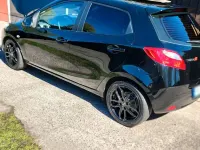 Używany Mazda 2 75 KM (55 kW) 2010 Czarny Hatchback