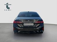 Gebraucht BMW 520 197 PS (144 kW) 2024 Sophistograu brillanteffekt (metallic) Limousine