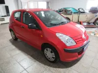Gebraucht Nissan Pixo Acenta 68 PS (50 kW) 2010 Rot Kleinwagen