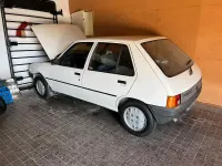 Gebraucht Peugeot 205 60 PS (44 kW) 1987 Weiß Kleinwagen