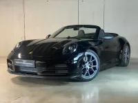 Gebraucht Porsche 992 394 PS (289 kW) 2025 Schwarz (metallic) Cabrio
