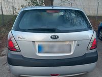 Second-hand Kia Rio 97 CP (71 kW) 2010 Argintiu Berlinǎ