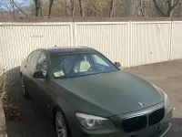 Second-hand BMW 740 306 CP (225 kW) 2011 Albastru Berlinǎ