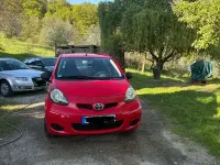 Gebraucht Toyota Aygo 69 PS (50 kW) 2011 Rot Kleinwagen