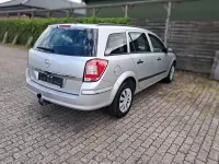Używany Opel Astra 115 KM (84 kW) 2009 Purpurowy Kombi