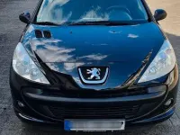Gebraucht Peugeot 206 60 PS (44 kW) 2010 Schwarz Limousine