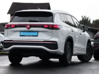 Gebraucht VW Tayron Elegance 272 PS (200 kW) 2025 Oryxweiß perlmutteffekt SUV
