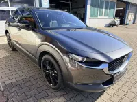 Gebraucht Mazda CX-30 Homura-Line 186 PS (136 kW) 2023 Machine grey SUV
