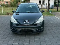 Gebraucht Peugeot 206 60 PS (44 kW) 2012 Grau Limousine