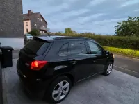 Używany Mitsubishi ASX 150 KM (110 kW) 2011 Czarny SUV