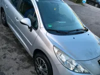 Gebraucht Peugeot 207 90 PS (66 kW) 2011 Silber Kombi