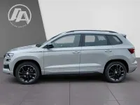 Gebraucht Skoda Karoq SportLine 190 PS (139 kW) 2023 Steel grau SUV