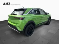 Gebraucht Opel Mokka Elegance 136 PS (100 kW) 2023 Lackierung matcha green/typ au SUV