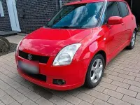 Używany Suzuki Swift 92 KM (67 kW) 2005 Czerwony Hatchback