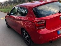 Usata BMW 114 102 CV (75 kW) 2013 Rosso Utilitaria