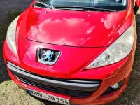 Gebraucht Peugeot 207 Premium 95 PS (69 kW) 2010 Rot Limousine