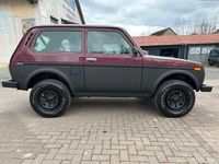 Second-hand Lada niva 82 CP (60 kW) 2004 Roșu SUV