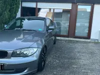 Second-hand BMW 116 Performance 122 CP (89 kW) 2009 Gri Hatchback