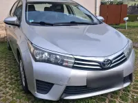 Używany Toyota Corolla 99 KM (72 kW) 2014 Szary Sedan/Limuzyna