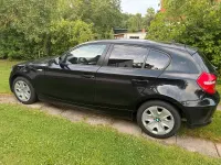 Gebraucht BMW 116 122 PS (89 kW) 2010 Schwarz Kleinwagen
