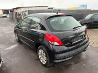 Gebraucht Peugeot 207 73 PS (53 kW) 2011 Schwarz Kleinwagen
